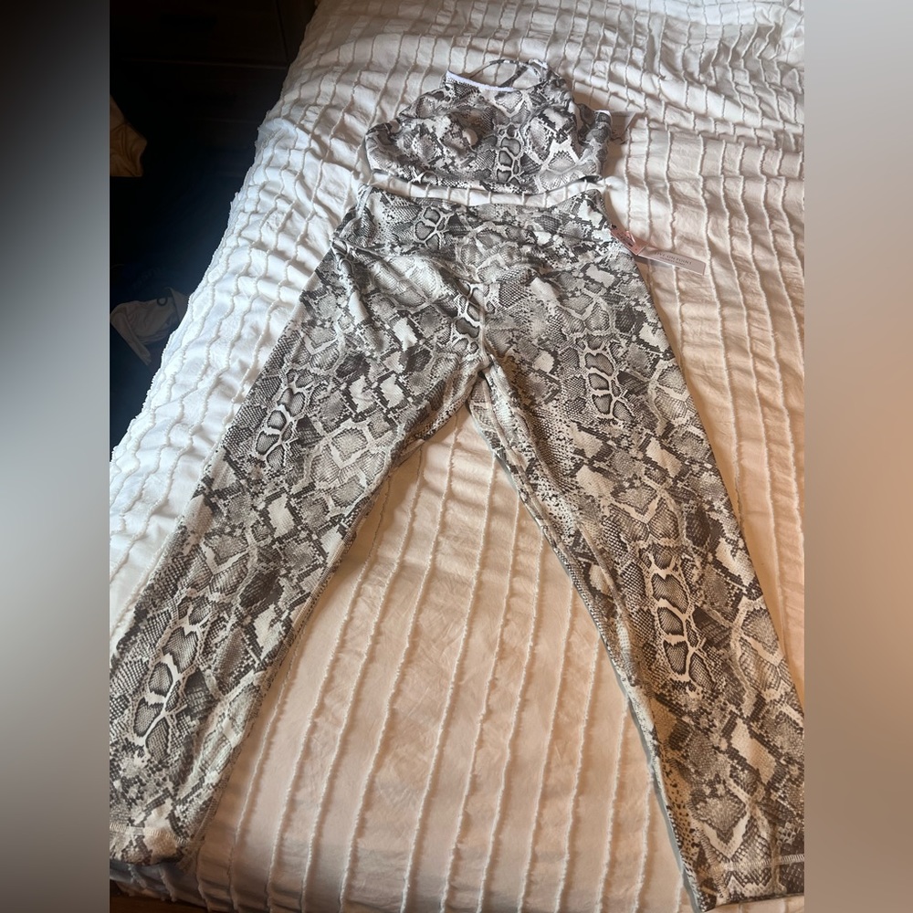 Brand new with tags Victorias Secret work out top and pants.